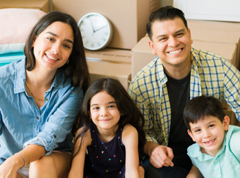 Family in home smiling